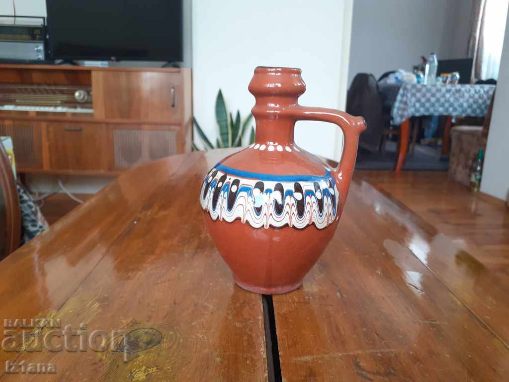 Auction An old pitcher Auction An old pitcher