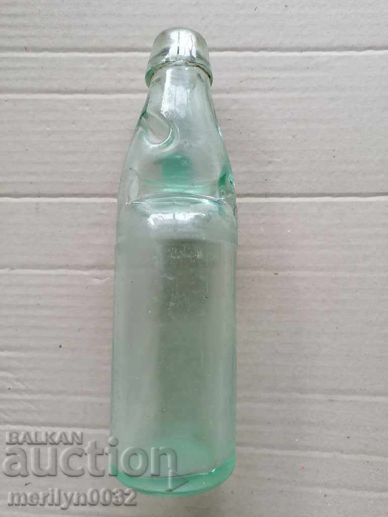 Bottle with a ball, a barrel, a bottle of lemonade beginning. 20th century