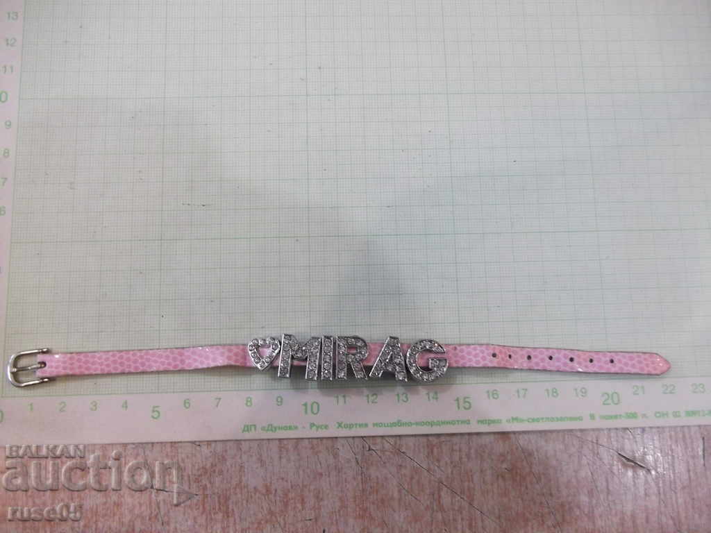 Παράδοση Λουράκι βραχιόλι από συνθετικό υλικό με την επιγραφή "MIRAG" Παράδοση Λουράκι βραχιόλι από συνθετικό υλικό με την επιγραφή "MIRAG"