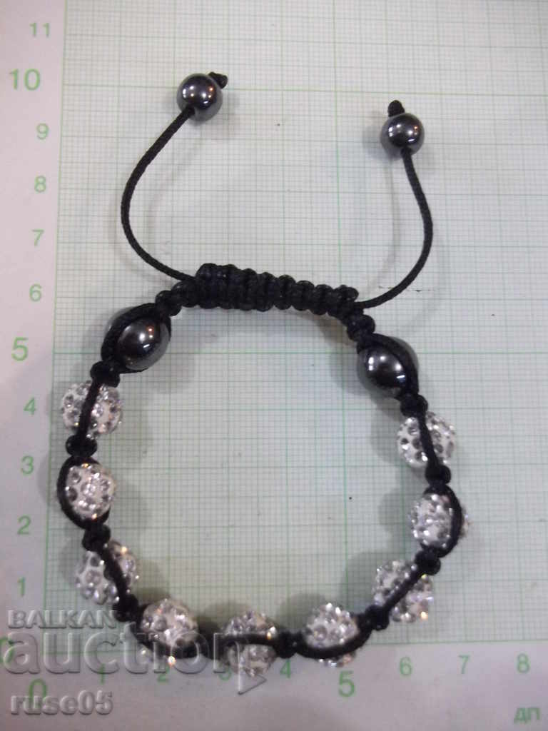 Delivery of Bracelet made of spheres inlaid with stones Delivery of Bracelet made of spheres inlaid with stones