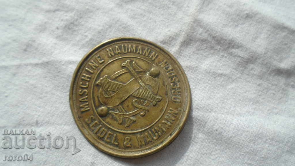 Auction  EMBLEM OF A SEWING MACHINE - XIX CENTURY