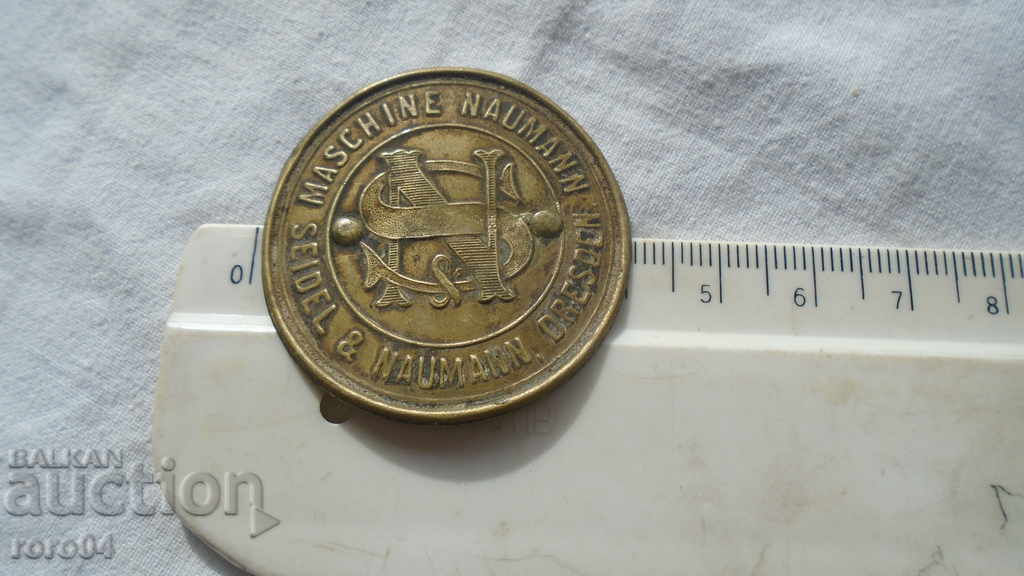 Delivery of EMBLEM OF A SEWING MACHINE - XIX CENTURY