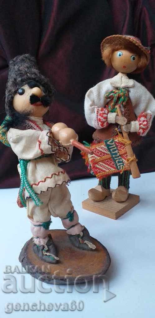 Auction  Souvenir old Russian dolls with costumes, musicians