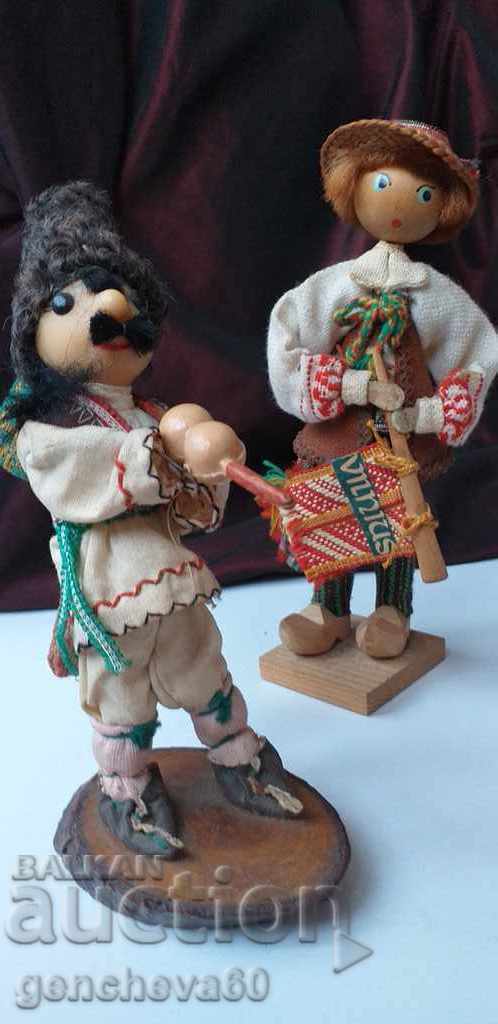 Souvenir old Russian dolls with costumes, musicians