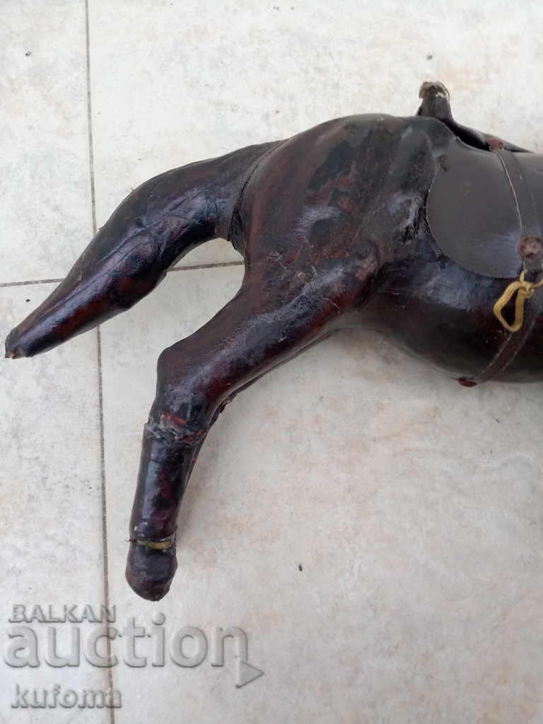 Old leather statuette on a horse - 5