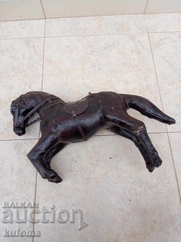 Old leather statuette on a horse - 6