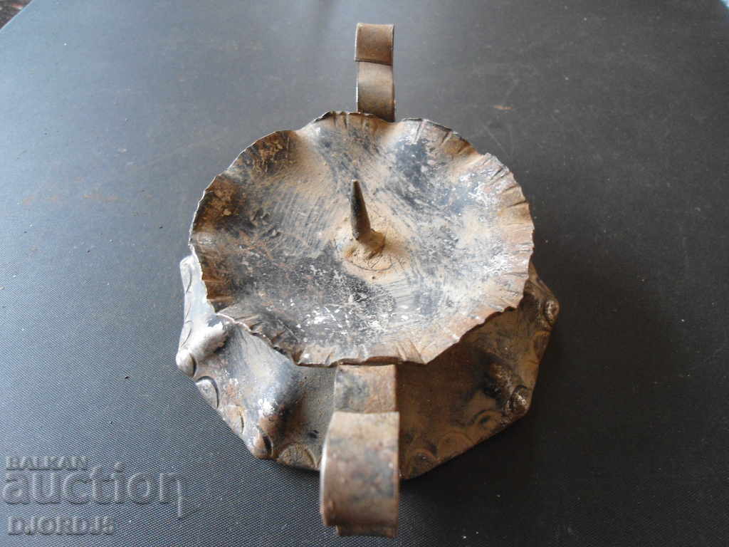 Old wrought iron candlestick with price 4.00 BGN | € 2.05 Old wrought iron candlestick with price 4.00 BGN | € 2.05