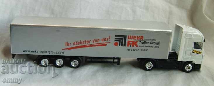 Auction  Mercedes with toy stroller trailer, metal and plastic