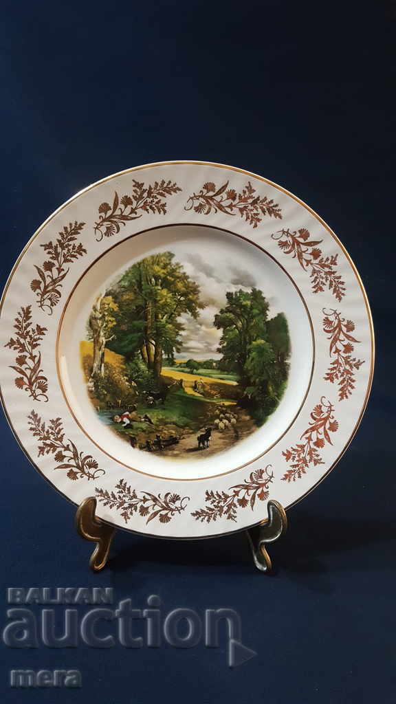 Lot of three porcelain designer plates - 7 Lot of three porcelain designer plates - 7