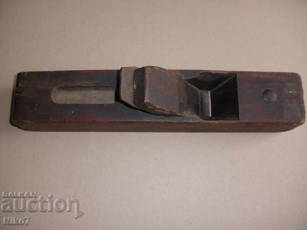 Old large carpenter's plane. Old large carpenter's plane.