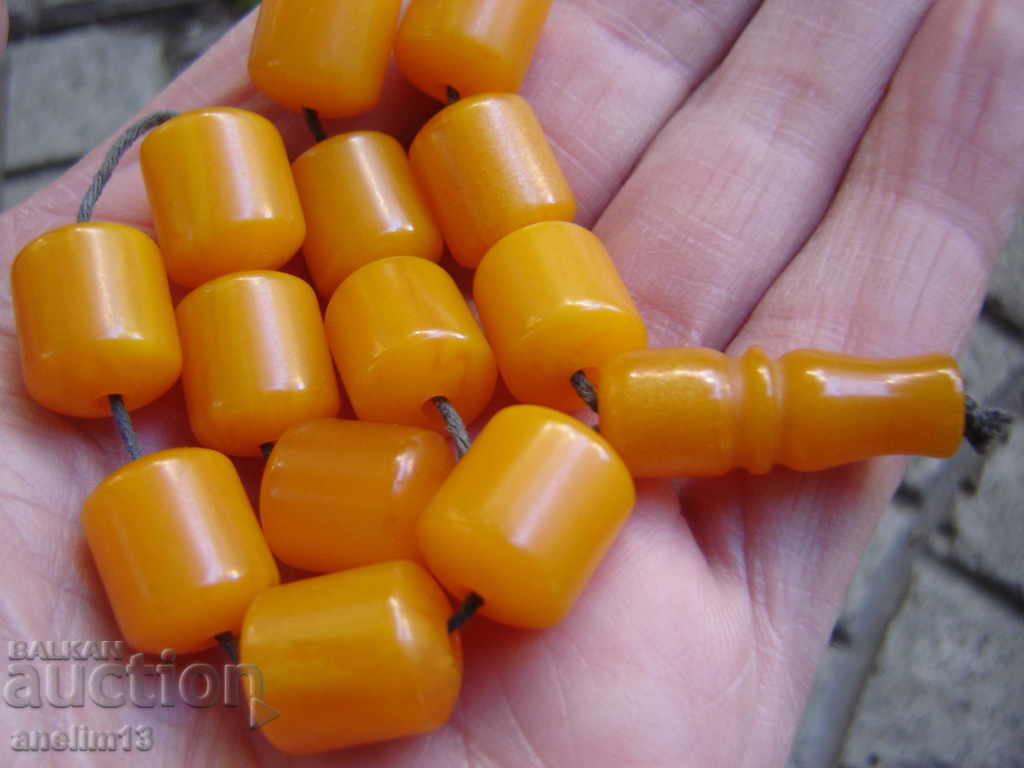 Delivery of OLD ROSARY BAKELITE AMBER