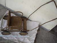 Very old toy-big stroller.