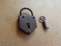 Old German padlock with key, catan, latch, coffer