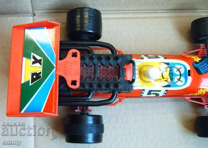 Auction  Racing rally car toy trolley sheet metal and plastic