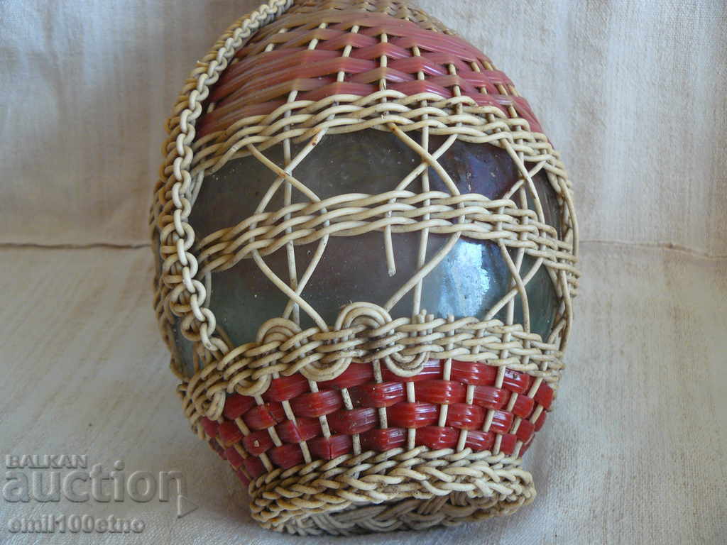 Delivery of Bottle - damajana with braid