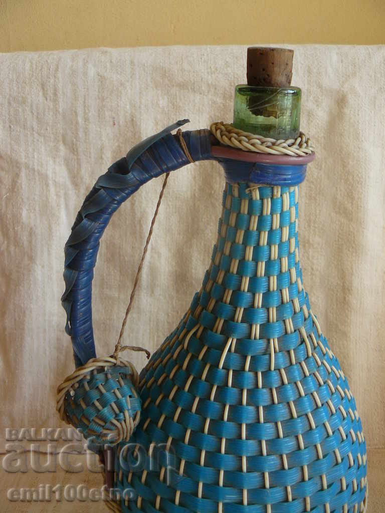 Delivery of Bottle - damajana with braid