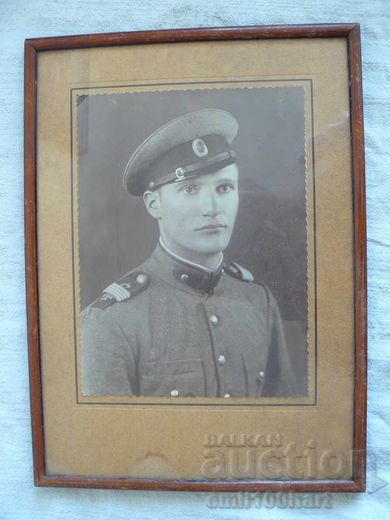 Large picture in a frame A soldier in a uniform of the tsarist era