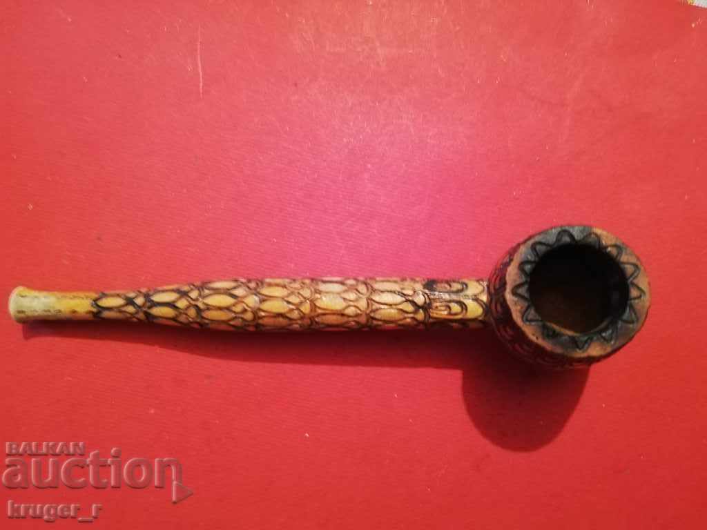 Auction  Old wooden pipe