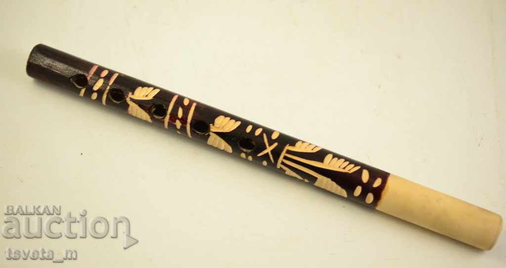 Auction A wooden whistle Auction A wooden whistle