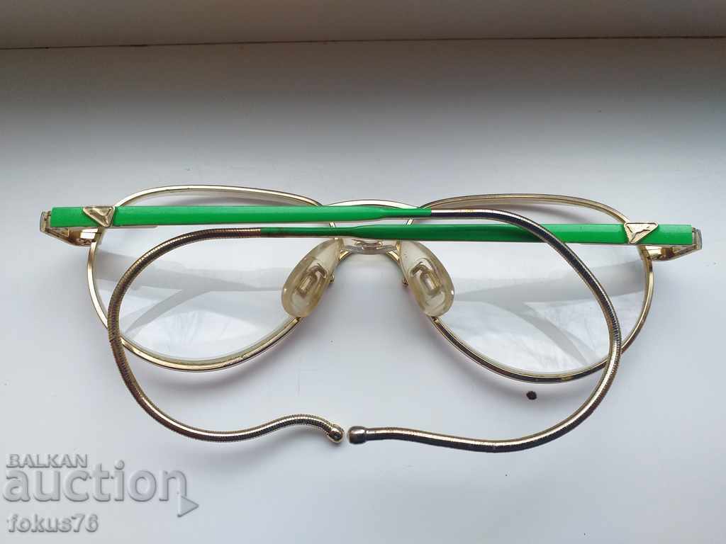 Auction  Old branded prescription glasses Puma