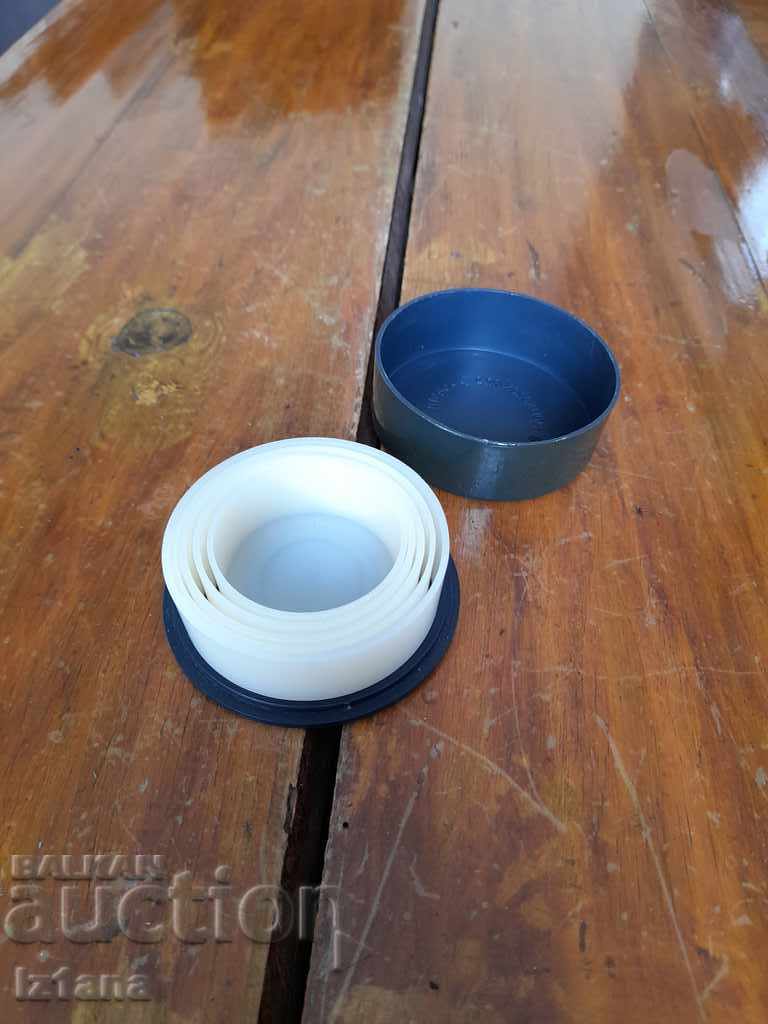 Auction  An old folding glass