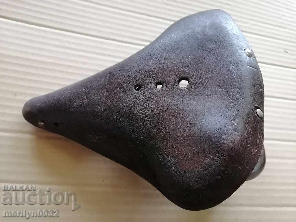Old leather bicycle seat marked with price 58.00 BGN | € 29.65