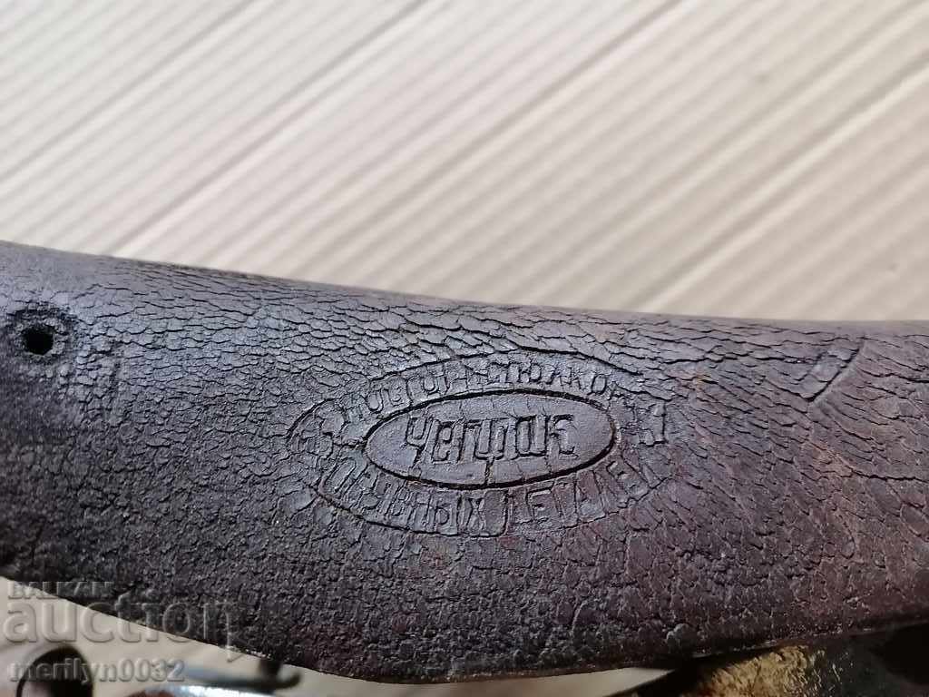 Auction  Old leather bicycle seat marked