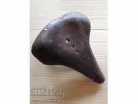 Old leather bicycle seat marked