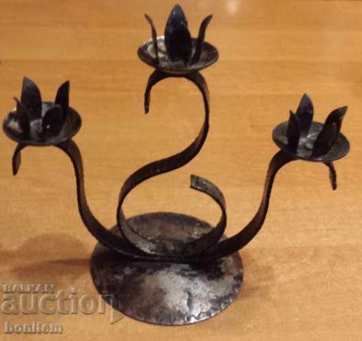 Old wrought iron candlestick