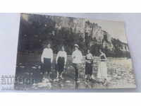 Photo Officer with four young girls on the river 1932