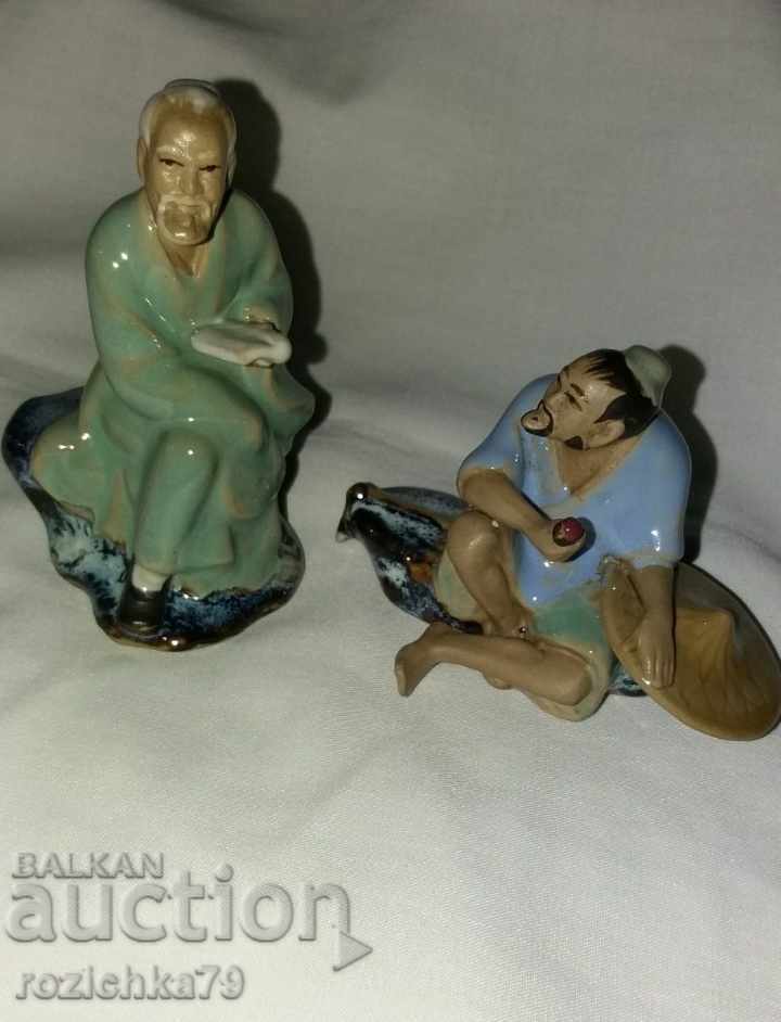 Two old porcelain figures