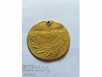 Brass medallion