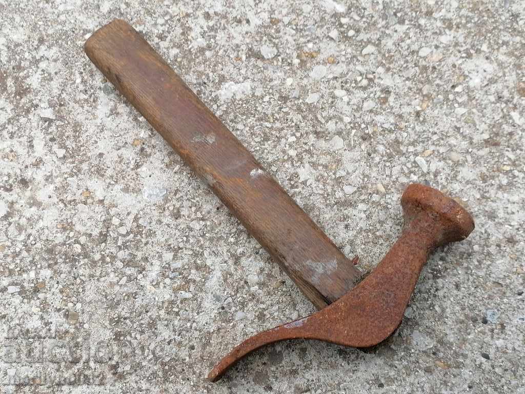 Old cobbler's hammer, shoemaker's tool, hammer Old cobbler's hammer, shoemaker's tool, hammer