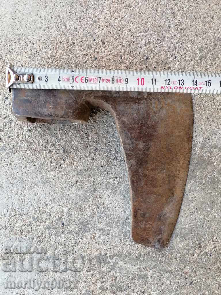 Delivery of An old ax tool wrought iron Delivery of An old ax tool wrought iron