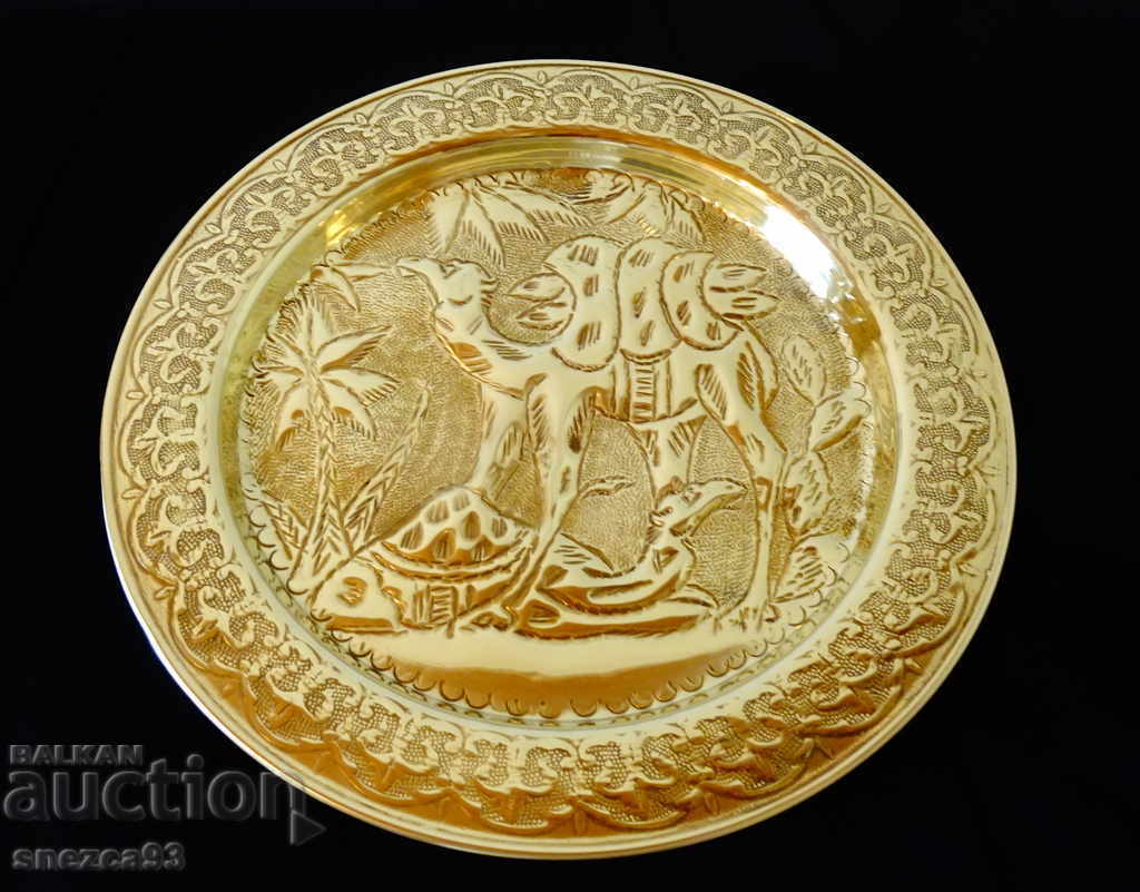 Delivery of Persian brass plate, platter, camel Delivery of Persian brass plate, platter, camel