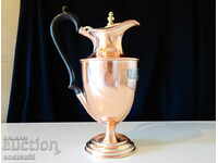 Aristocratic English copper jug.