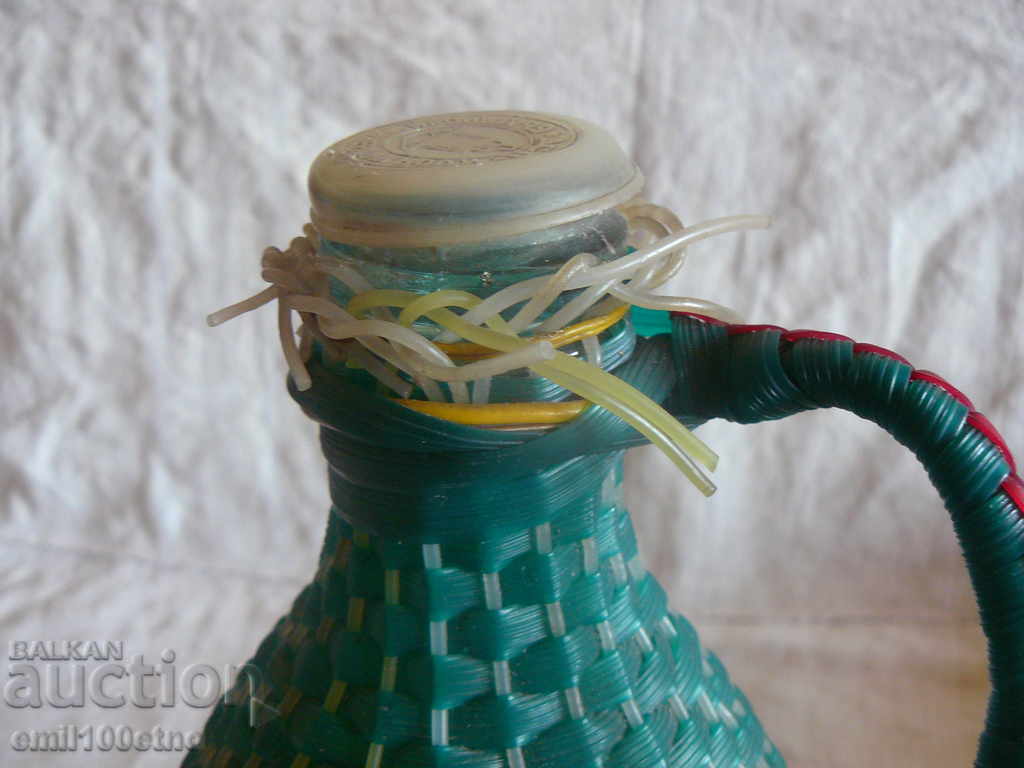 Delivery of A big old bottle of mineral water with a braid like damajana Delivery of A big old bottle of mineral water with a braid like damajana