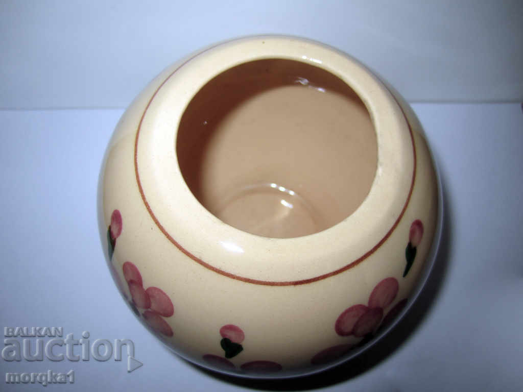 Auction Dutch spherical ceramic vase with floral motifs Auction Dutch spherical ceramic vase with floral motifs