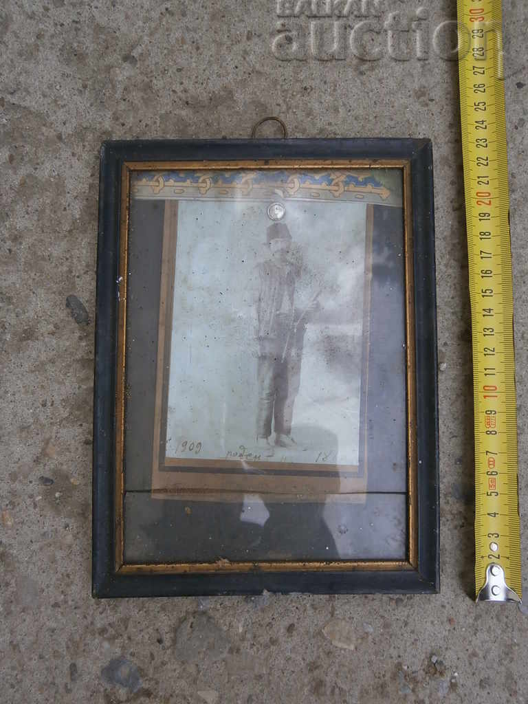 Old picture in a frame, bagpipe photography