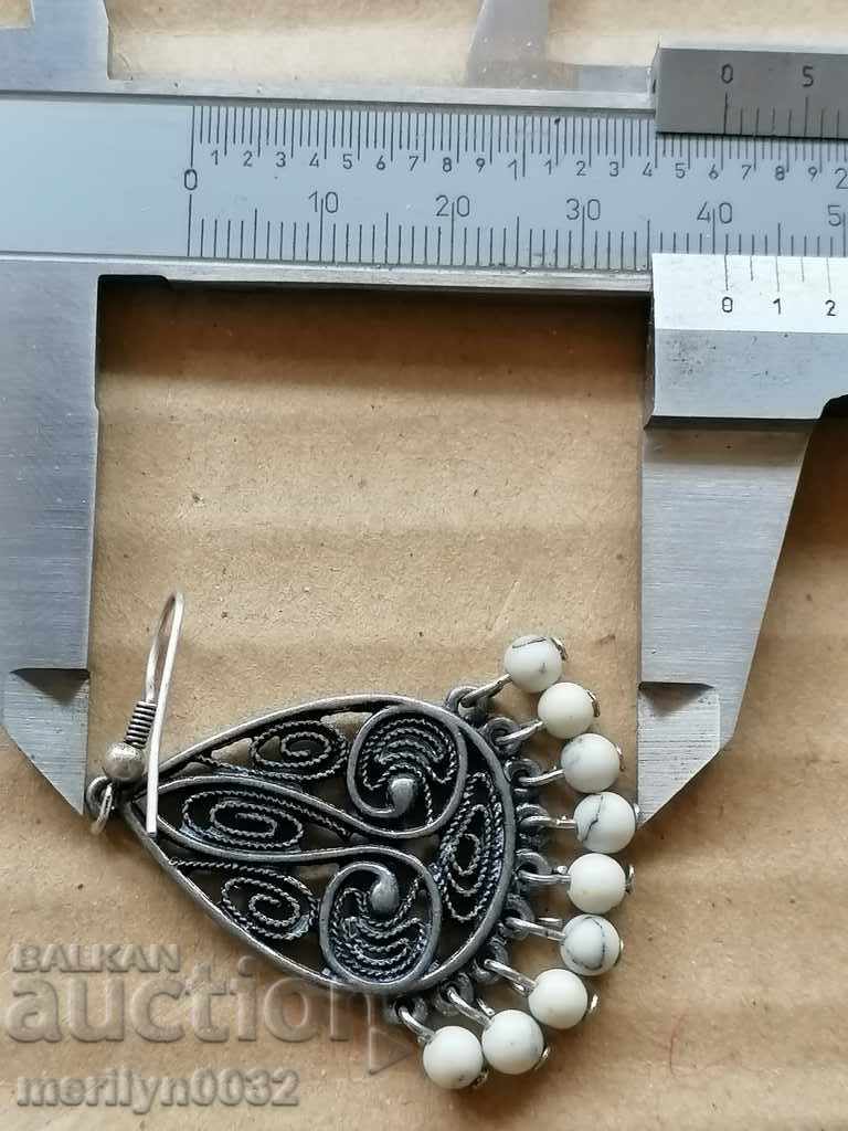 Delivery of A pair of boutique earrings, jewelry, earrings