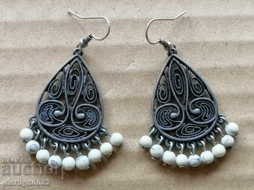 A pair of boutique earrings, jewelry, earrings