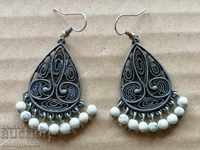 A pair of boutique earrings, jewelry, earrings