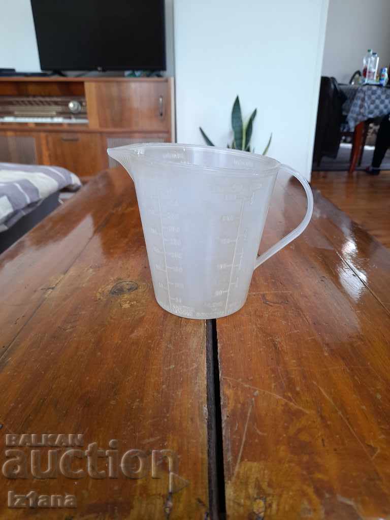 Auction Old measuring jug Auction Old measuring jug