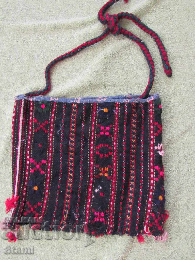 An old hand-woven woolen trap bag from the beginning of the 20th century