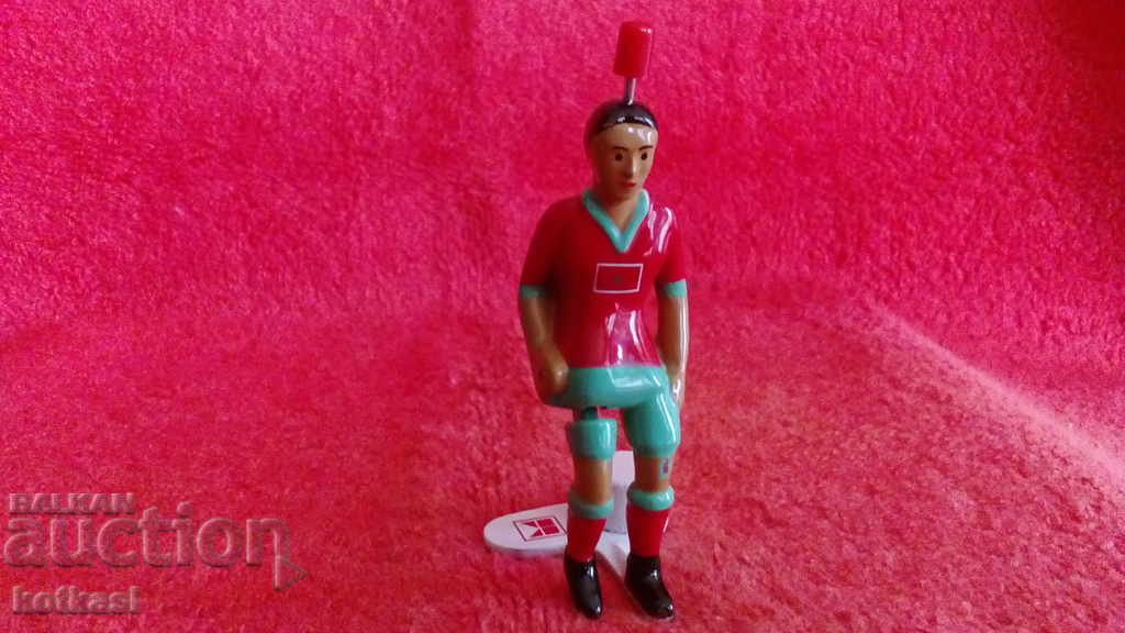 Metal sports figure of a Moroccan football player