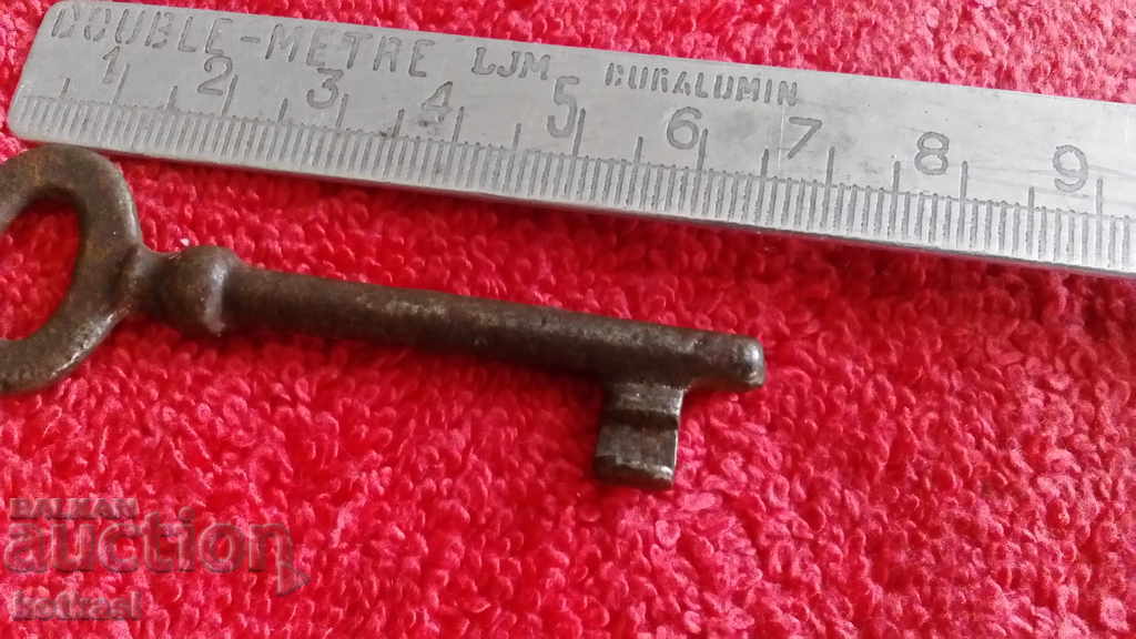 Auction An old small iron key Auction An old small iron key