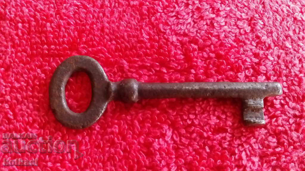 Delivery of An old small iron key Delivery of An old small iron key