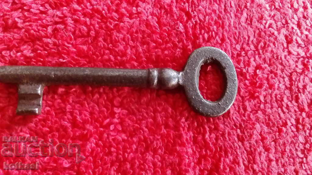 An old small iron key - 7