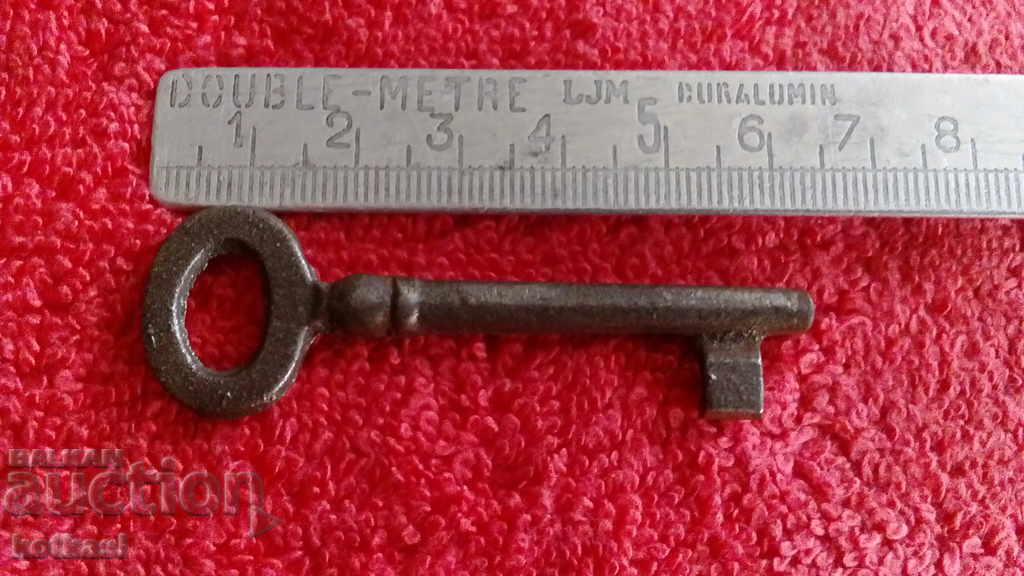 An old small iron key