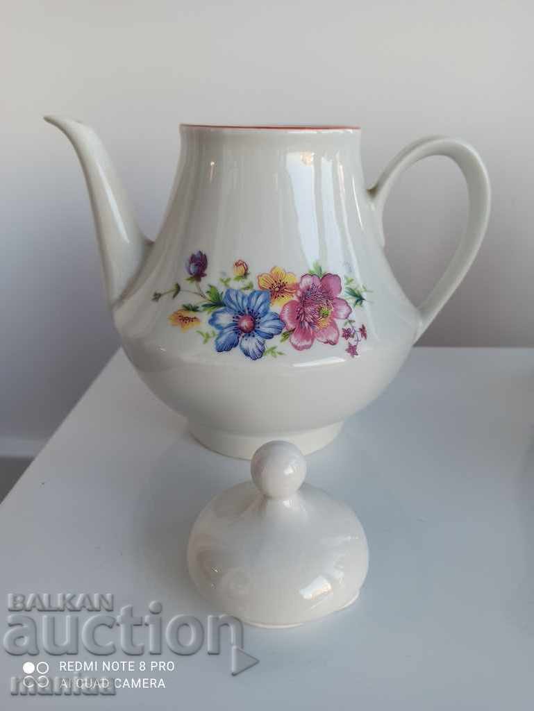 Auction Porcelain teapot marked Auction Porcelain teapot marked